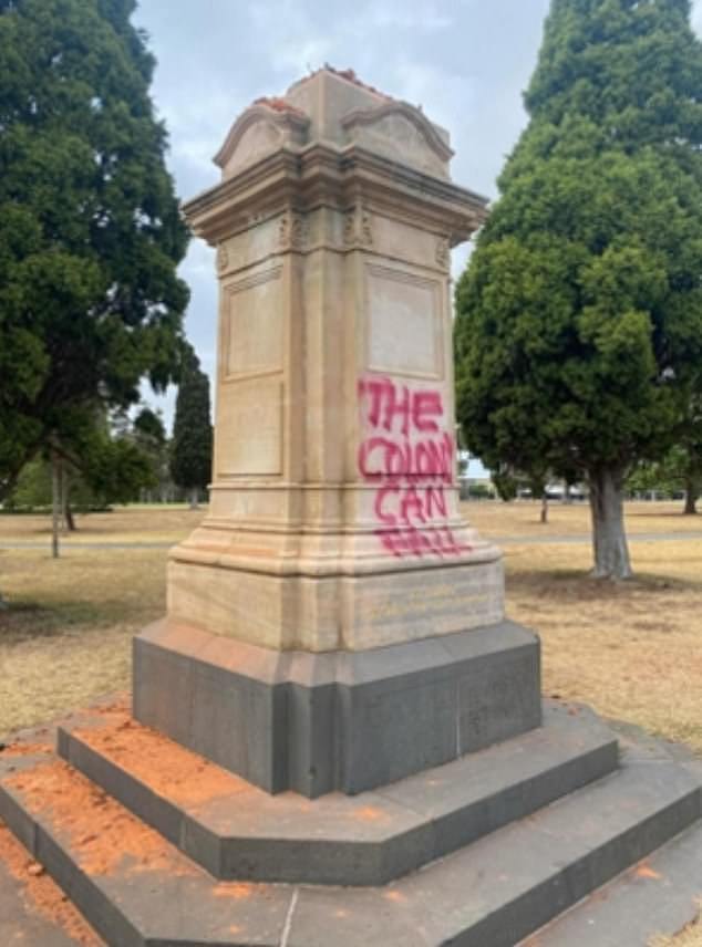 A slogan saying 'the colony can fall' was sprayed across the plinth the Queen Victoria statue stood on (pictured)