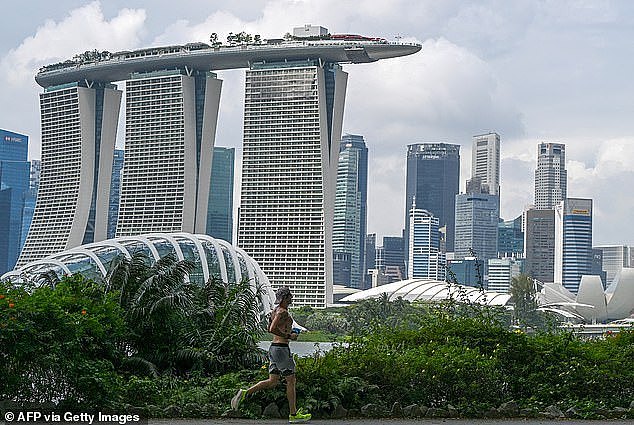 Australia is the top destination for Singapore property investors as its millionaires look for someone to retire or send their children to study (pictured is Marina Bay Sands in Singapore)