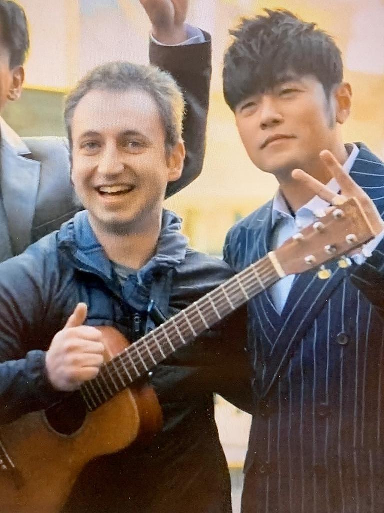 Melbourne busker Mark Balas with Jay Chou in the Bourke Street Mall. Picture: Supplied