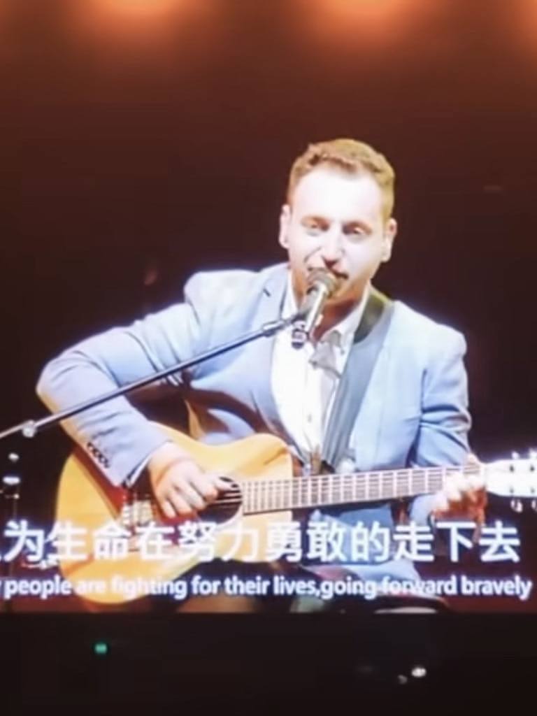 Mark Balas performing on stage at Rod Laver Arena with Jay Chou. Picture: Instagram