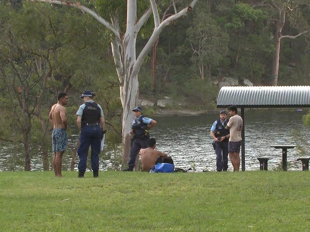 Police were seen speaking to several men at the scene. Picture: TNV