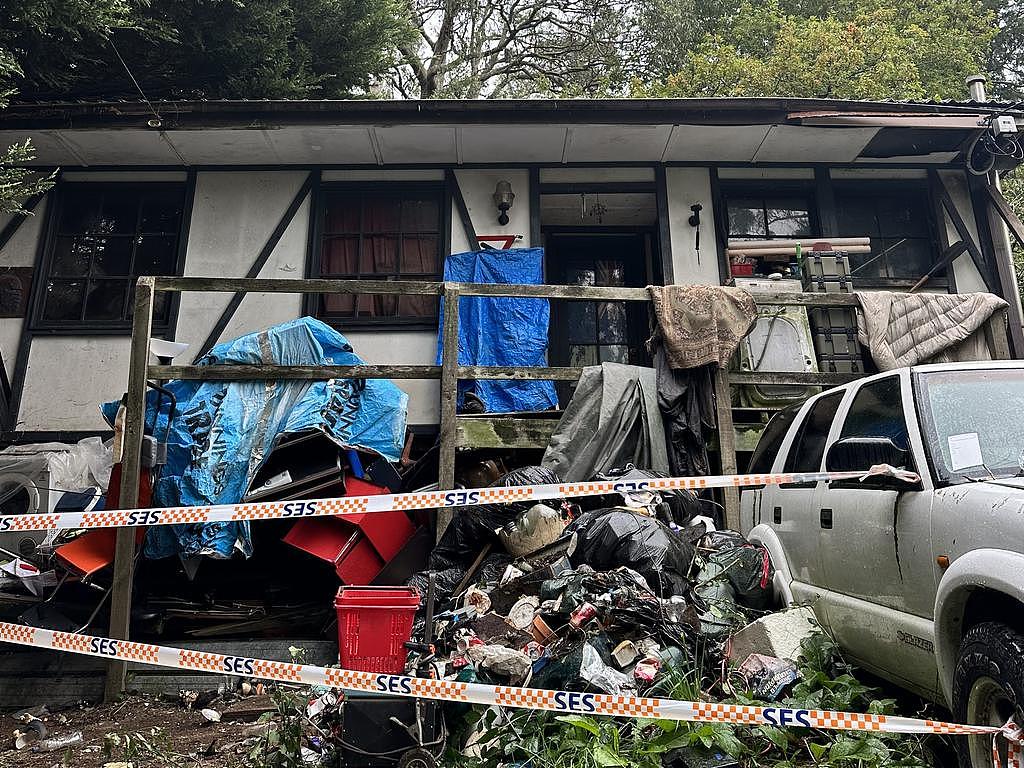 Two people, including an on-duty paramedic, were hospitalised after the balcony they were on collapsed in the Dandenong Ranges on Friday night. Picture: Lauren Hutchinson