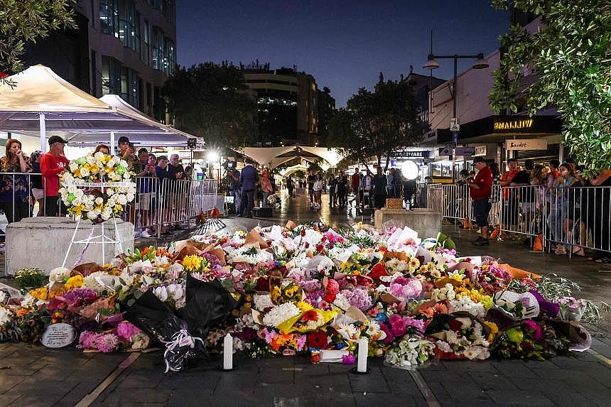 Vigil held for victims of Sydney mall attack | The Straits Times