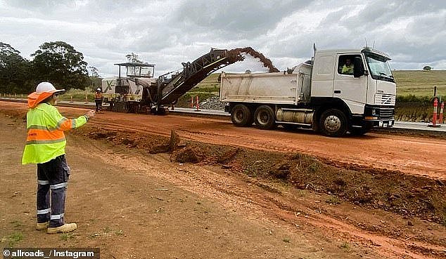 Construction companies specialising in road building have collapsed, owing creditors more than $80million (pictured is a New England Highway upgrade in southern Queensland)