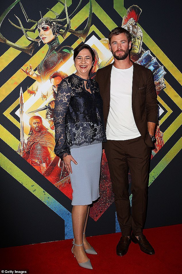 Ms Palaszczuk's penchant for appearing at celebrity events and awards ceremonies led to her critics labelling her a 'part-time premier' (pictured with Chris Hemsworth)