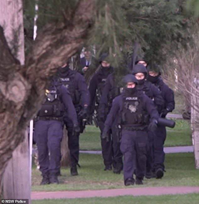Officers from NSW's Cybercrime Squad arrested a 46-year-old man during a raid in Fairfield West on Thursday afternoon
