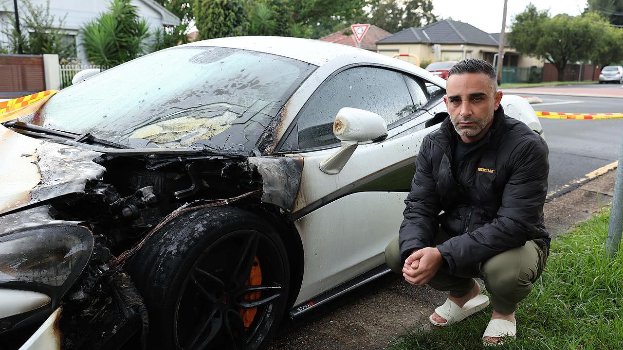 Hamed Ajaje with his destroyed McLaren. Picture: Tim Hunter