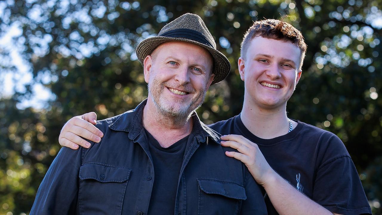 Jayden Cummins, pictures with his son Henry, had a heart transplant after a serious flu left him with cardiomyopathy. Picture: Justin Lloyd.