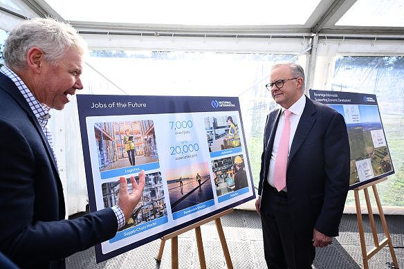 Prime Minister Anthony Albanese (right) views construction plans at the Beveridge intermodal precinct.