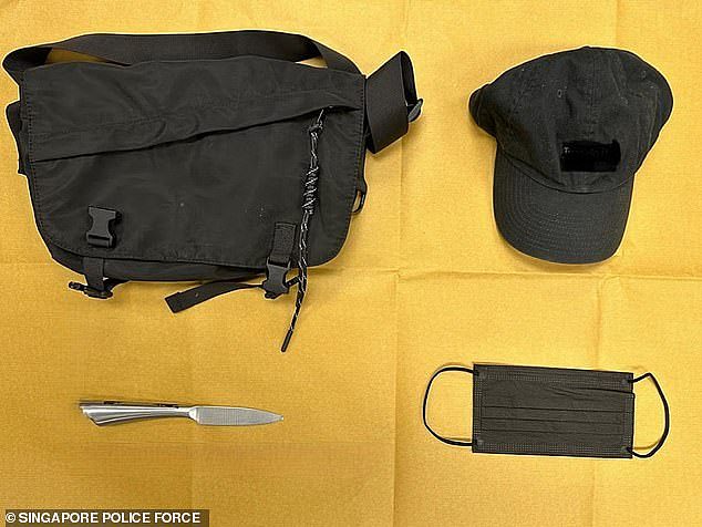 Australian man Jose Manuel Pacheco has been charged with armed robbery using a knife at a money lending shop in the Tampines district of Singapore. The items Pacheco allegedly used are pictured