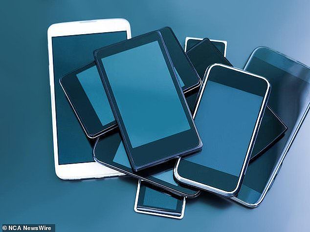 Up to $50,000 worth of smartphones, smart watches and tablet devices were seized by officers (stock image)