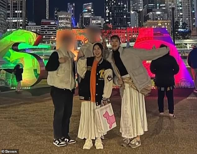 Wu Aiting (front, centre) was walking with three friends, aged in their early 20s, when they were attacked by four people, two women and two men, in Southbank on Monday night