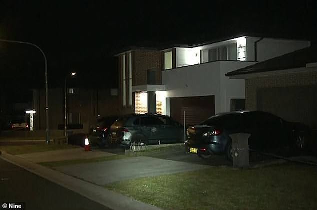Emergency services rushed to a home (pictured centre) on Mary Wade Place in Carnes Hill, about 40km southwest of Sydney's, CBD, at about 12.45am on Tuesday