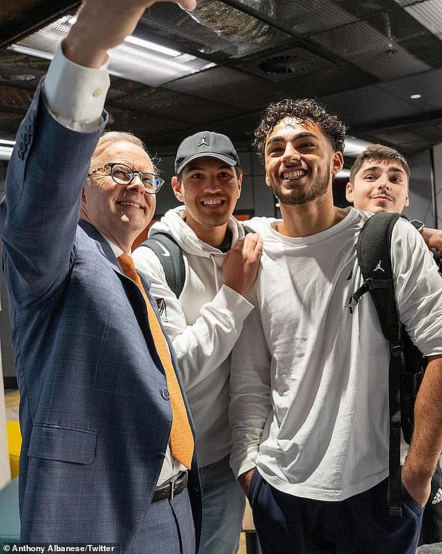 Mr Albanese posted a photo of himself posing with three university students to remind Australians his government planned to wipe more than $3billion in HECS debt