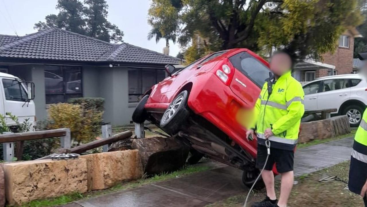 A car skidded off the road and into the front yard of a home at the corner of the Minto intersection, 1 June 2024. Picture: Facebook