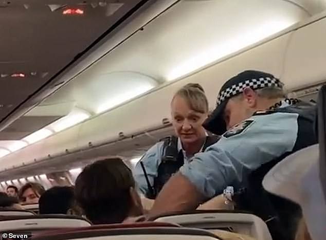 A man on board a Virgin Flight (pictured) at Melbourne airport on Tuesday, was arrested in dramatic scenes by AFP officers