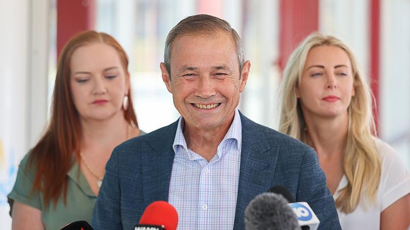 WA Premier Roger Cook speaks at a press conference to announce cost of living relief measures at Whitfords train station.