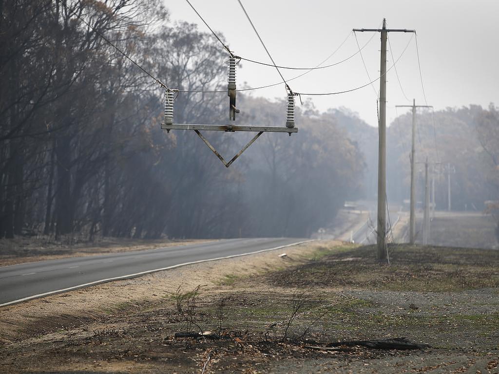 File image: Missing power pole, burnt to ashes on the Genoa-Mallacoota road in Victoria after the 2019-20 bushfires. Picture: David Caird