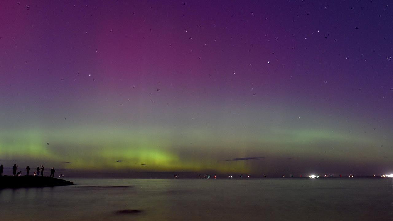 Victorians were dazzled by an aurora australis caused by a solar storm in May. Pictured in the display visible in Port Phillip Bay. Picture: AFP
