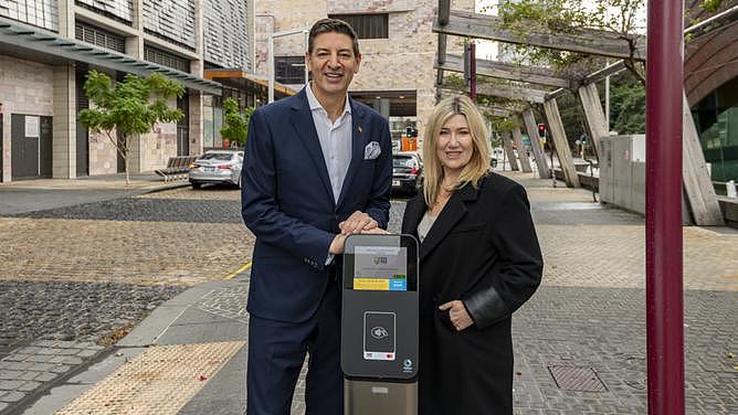 City of Perth Lord Mayor Basil Zempilas and CEO Michelle Reynolds with one of the new parkign meters.