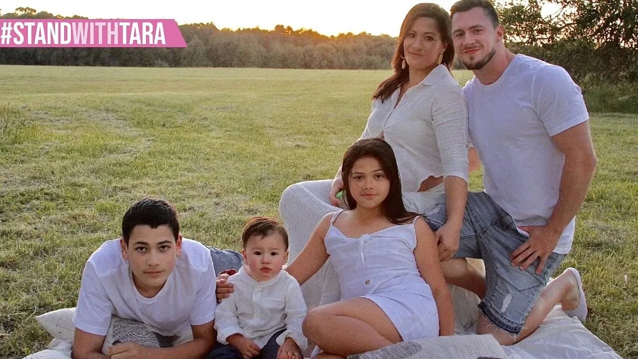 Tara Enoka pictured with her husband and children.