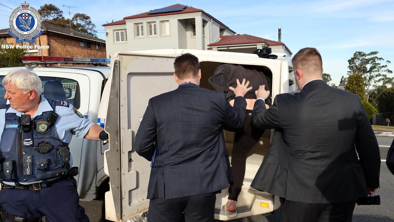 Police arrest a man at Winston Hills after a manhunt. Picture: NSW Police