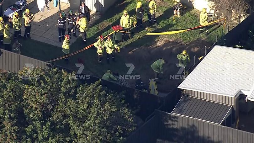 Both paramedics and firefighters are responding to reports the man became trapped inside either a hole or a trench near Orbell Road just before 3pm.