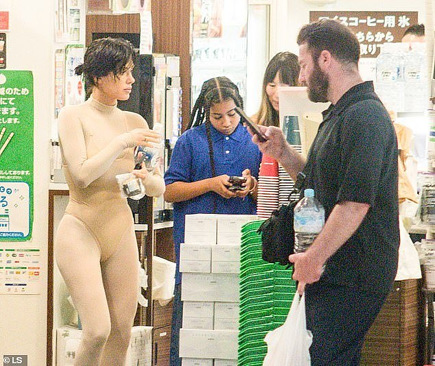 Kanye West's wife Bianca Censori brushed off concerns about her risqué dress sense around the rapper's children as she headed out for a shopping trip in Tokyo on Thursday