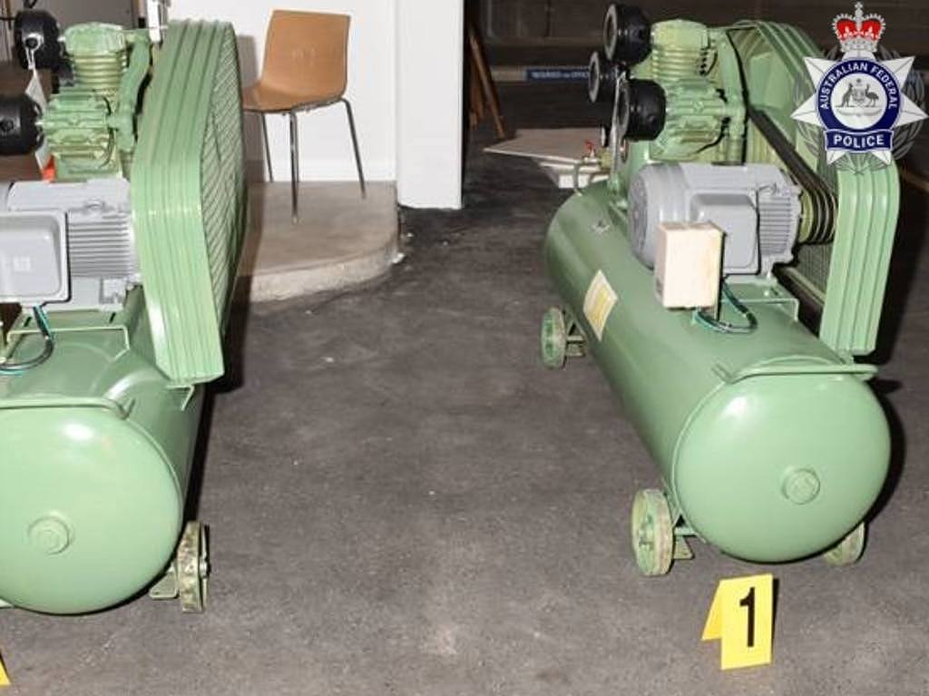 160kg of pure meth was also uncovered inside these two air compressors. Picture: AFP