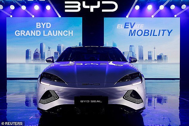 Australia could be making electric cars instead of importing them from China if he wasn't for a major blunder a decade ago, a former minister says (pictured is a BYD Seal)
