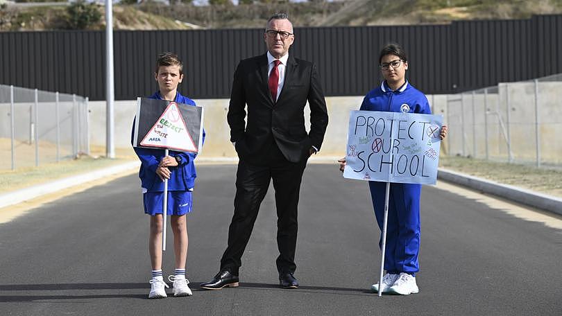 St Andrew’s Grammar are concened about a proposal to put a noxious waste site near the school. L-R Koen, School Principal Craig Monaghan and Marija.