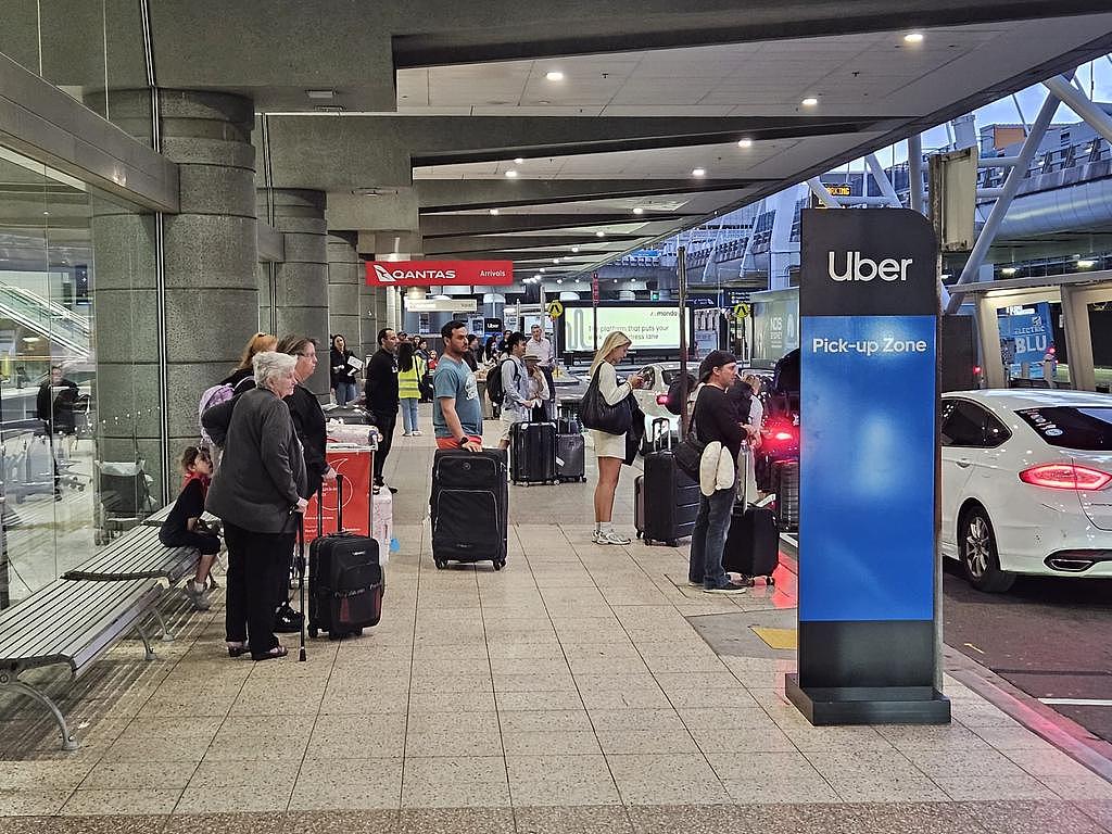 Uber also launched dedicated pick-up zones at major airports across the country. Its Sydney zone (pictured) has reduced traffic by 36 per cent since its launch earlier this year.