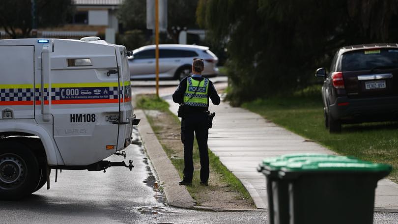 Police at the scene on Marlboro Road in Swan View. 