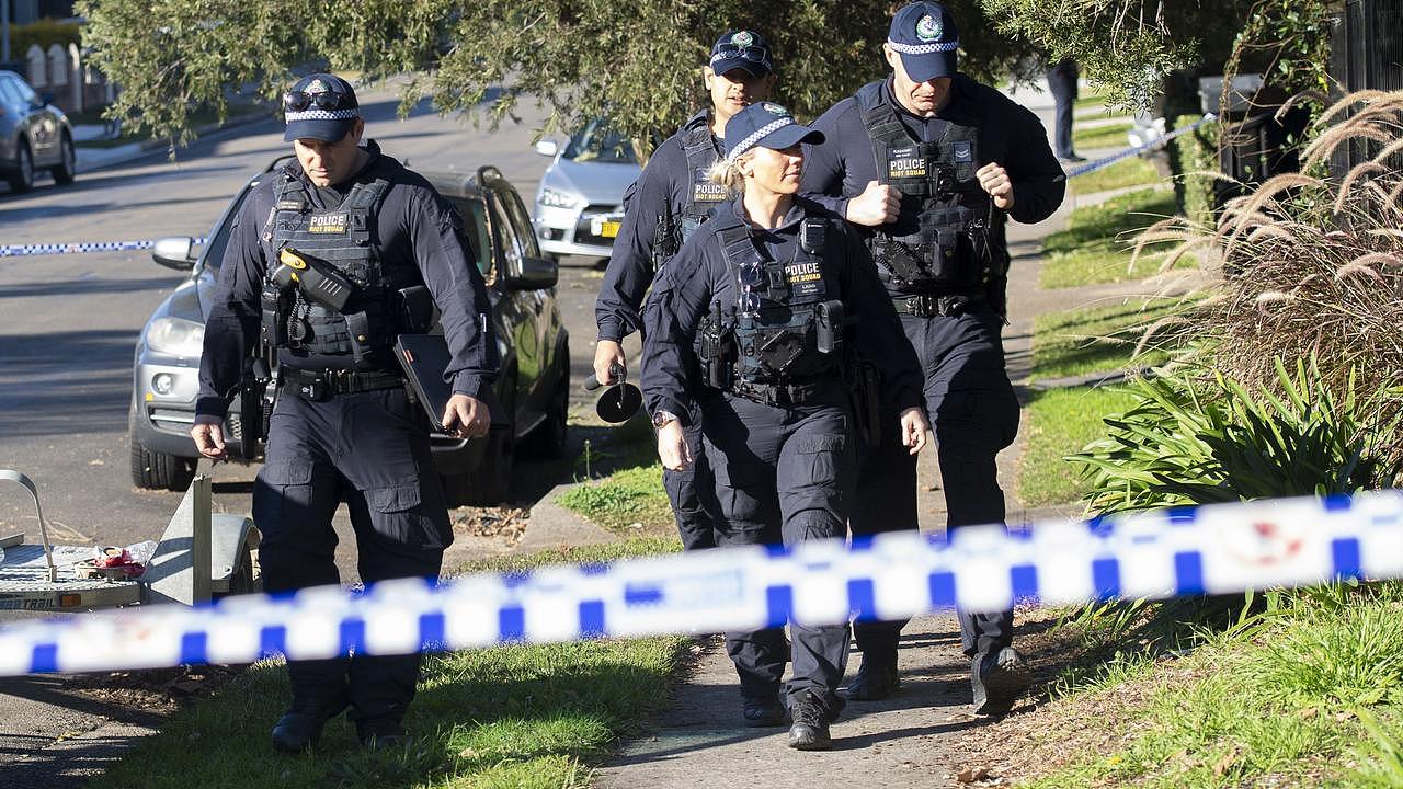 Public Order and Riot Squad officers at the scene on Saturday. Picture: NewsWire / Jeremy Piper ,