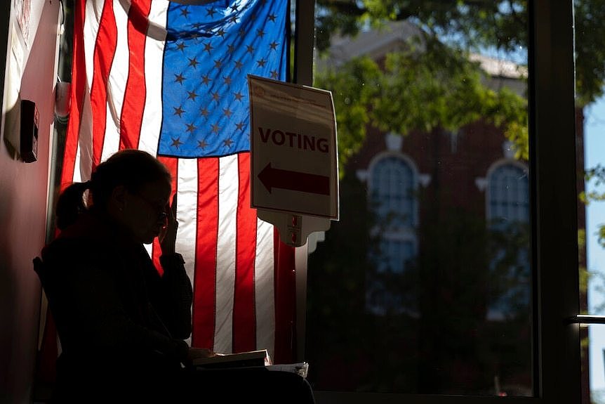 Poll worker. AP