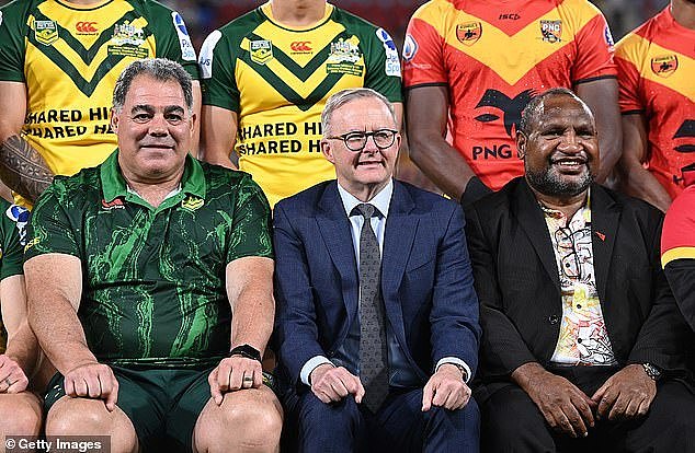 The Prime Minister of Papua New Guinea, James Marape (right), has dismissed safety concerns in his country as the Australian government gears up to donate $600m of taxpayers money towards the establishment of an NRL team in Port Moresby. Pictured: Mal Meninga left, Anthony Albanese centre