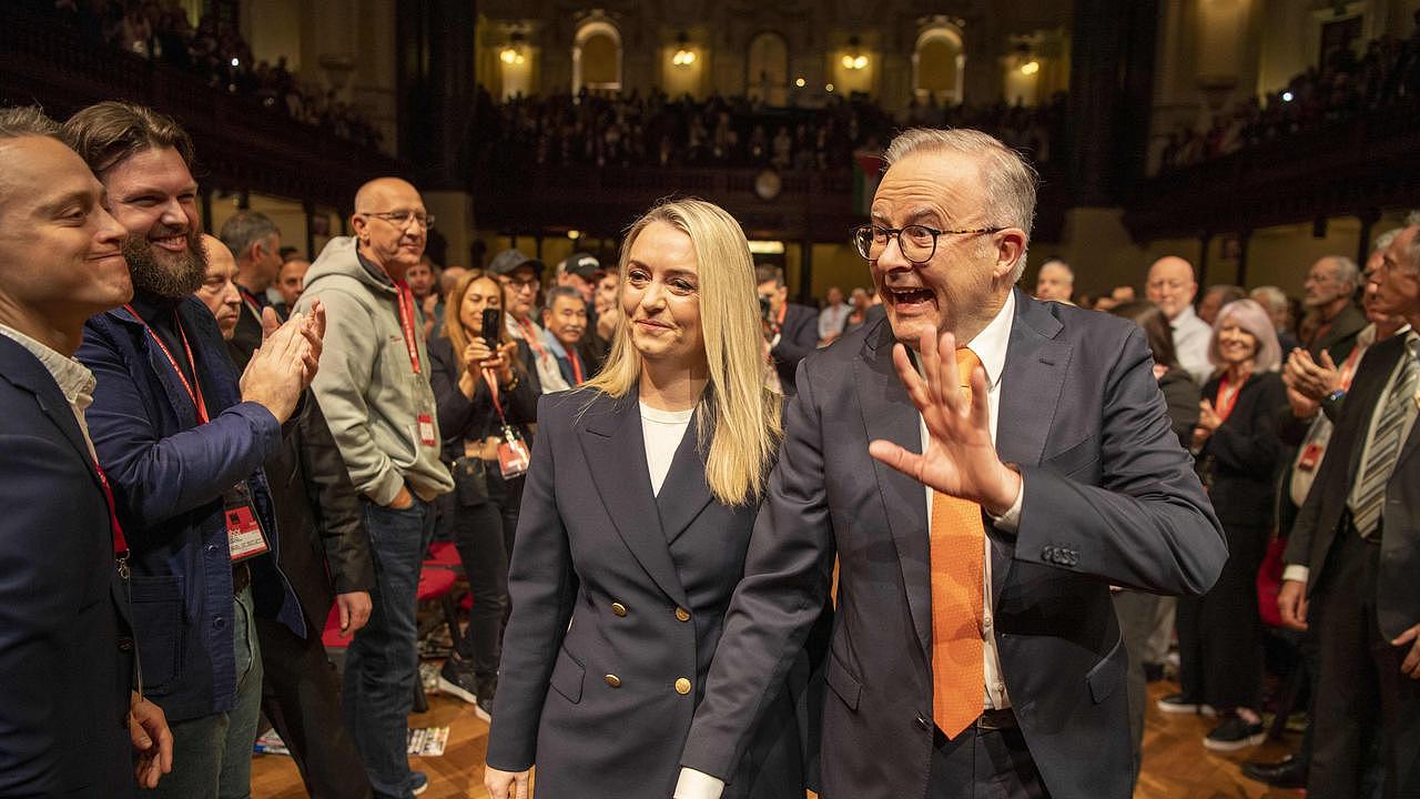 Anthony Albanese entering the conference alongside partner Jodie Haydon. Picture: NewsWire/ Simon Bullard.