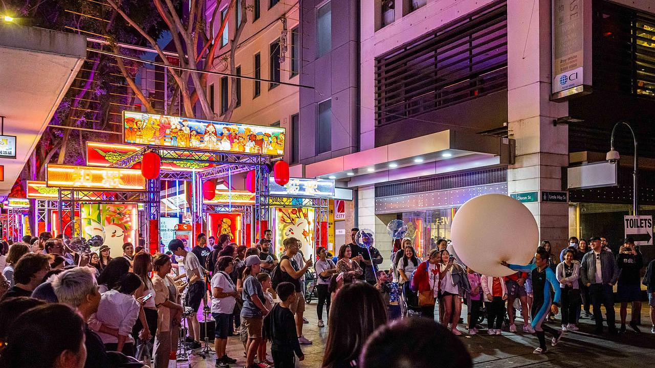 Street entertainers attract crowds in Chinatown during Lunar New Year. Picture: City of Sydney