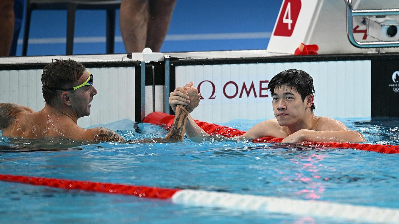 Mutual respect. Photo by Oli SCARFF / AFP.