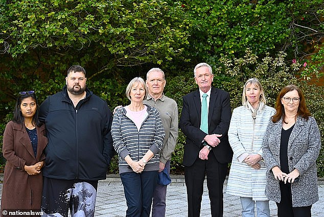 WA Opposition leader Shane Love (centre) with some of Mr Michel-Elhaj's affected customers