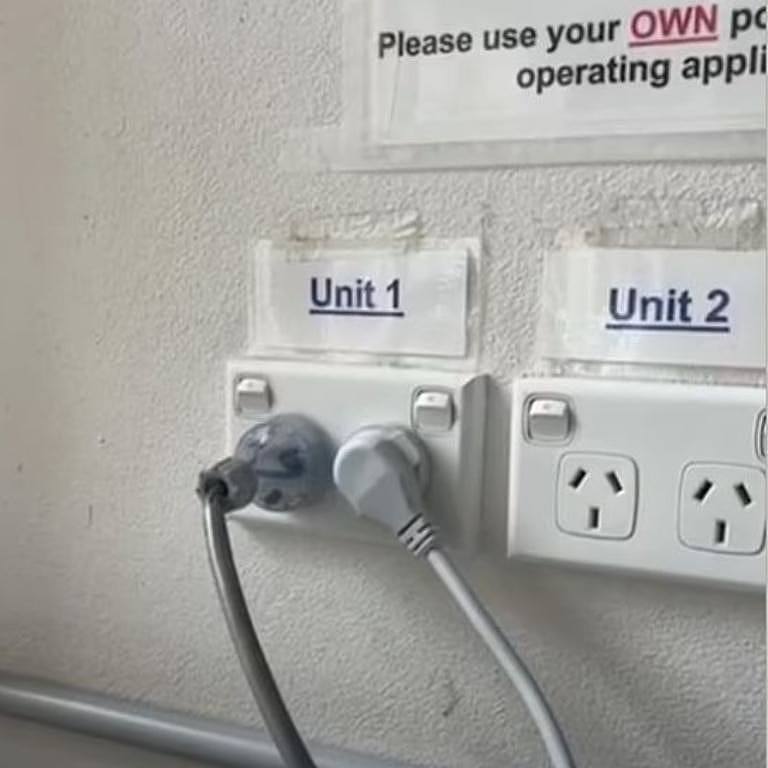 The man shared a photo showing a neighbour's extension cord plugged into his outlet. Picture: Facebook