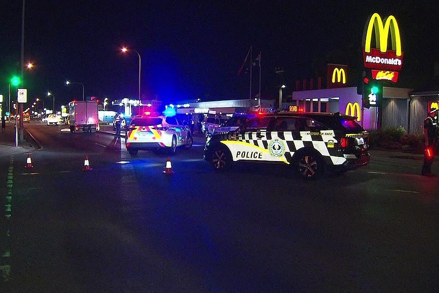 Police vehicles on an Adelaide road.