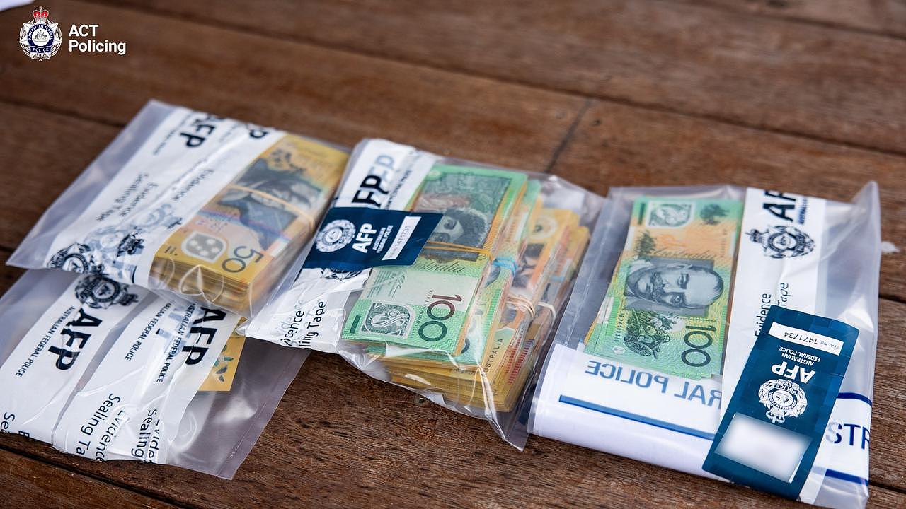 Cash allegedly found at Wei Wang’s home during last month’s raids. Picture: ACT Policing