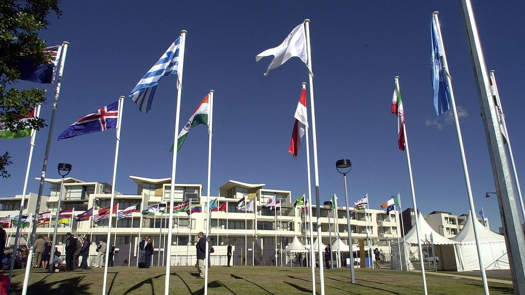 AUGUST 9, 2000 : Flags fly outside athletes accommodation at Sydney 2000 Olympic Games Village at Homebush, 09/08/00. Pic Jeff Darmanin.