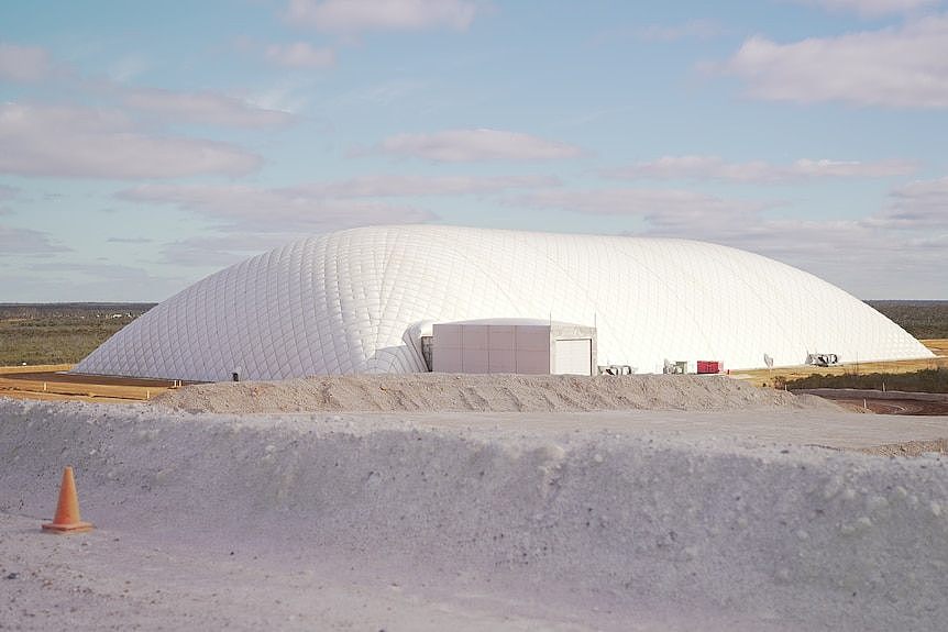 A large white dome that houses low-level radioactive waste. 