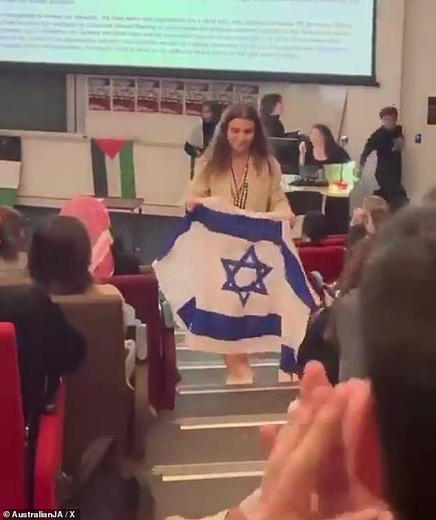 Despite an extremely hostile crowd, Sydney University student Freya Leach spoke passionately about condemning Hamas atrocities