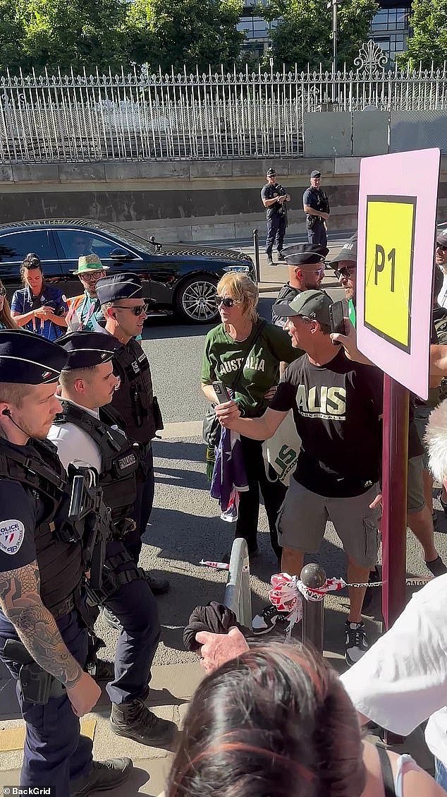 The parents of Australian Opals players desperately tried to get back inside the venue to watch the medal ceremony but armed officials would not budge