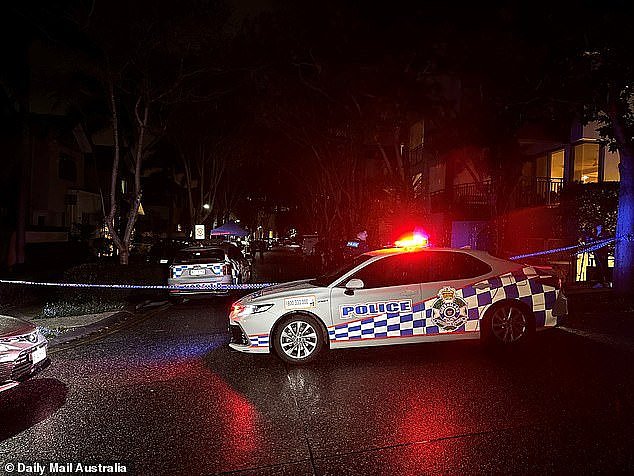 A 10-year-old girl has been found dead at home with her throat slashed. Emergency services are seen at the scene