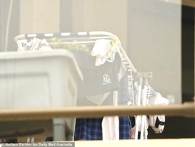 In a heartbreaking reminder of the domestic tragedy, some items of little Sophie’s school uniform could be seen drying on the line on the balcony at the back of the house (pictured)