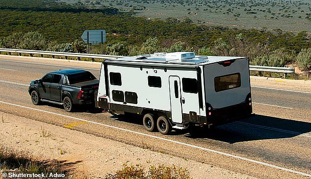 A car with a caravan attached was stolen from a holiday park in central Queensland with a young family-of-five still inside (stock image)